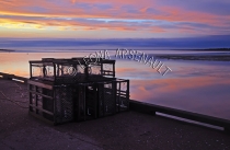 CANADA;PRINCE_EDWARD_ISLAND;SUNSETS;DUSK;LOBSTER_TRAPS;TRAPS;SILHOUETTES;WATER;N